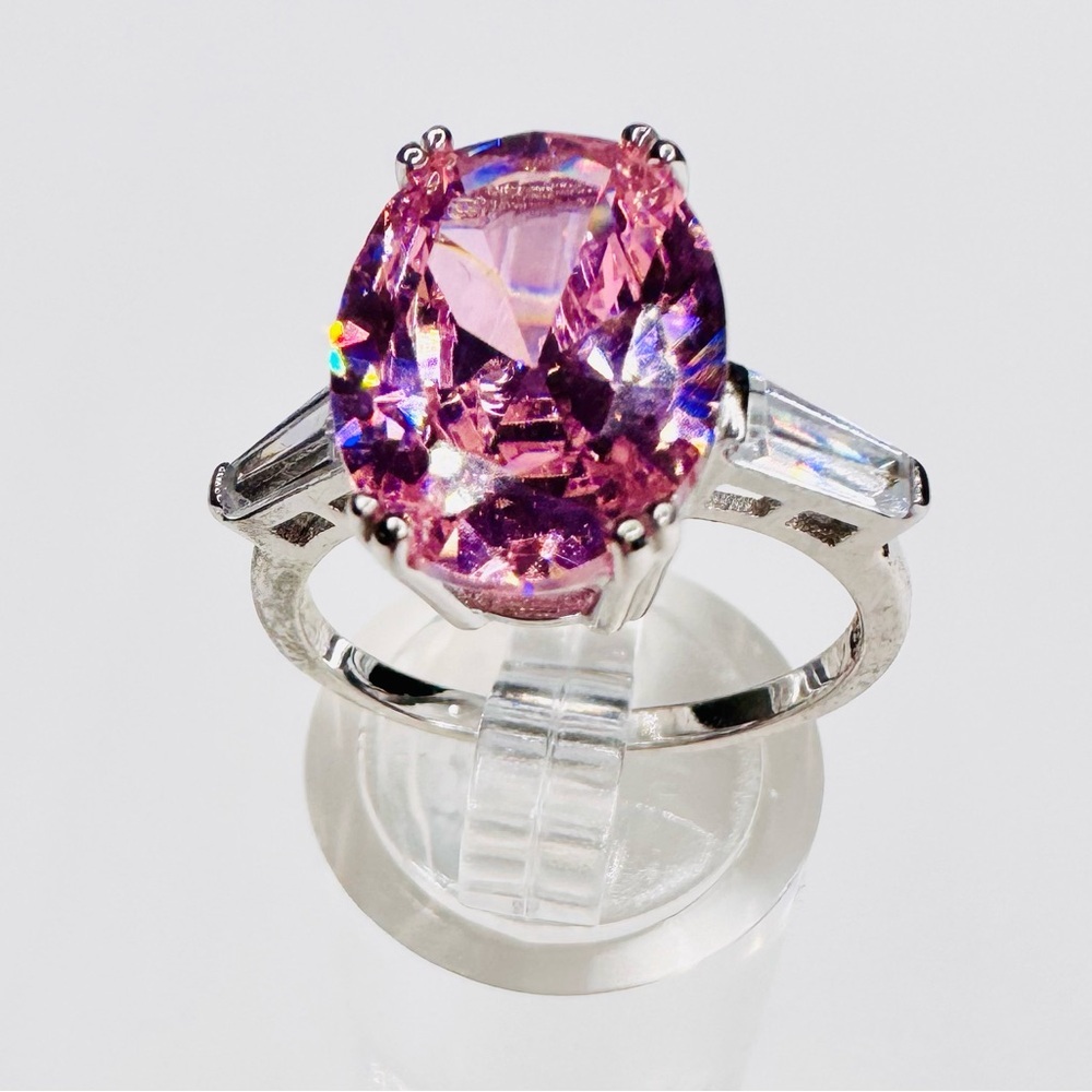 Elegant Sterling Silver Ring with Facet Cut Pink Gemstone and Baguettes